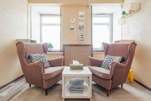 Room with a couple of armchairs and a coffee table
