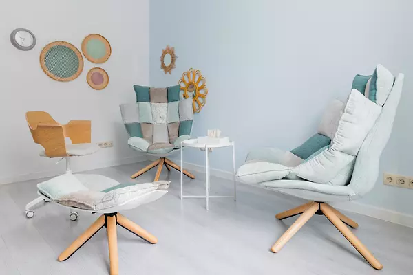Room with armchairs and coffee table