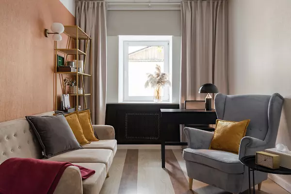 Beautiful comfortable office with orange accents