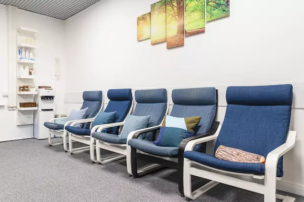 Room with high-back armchairs